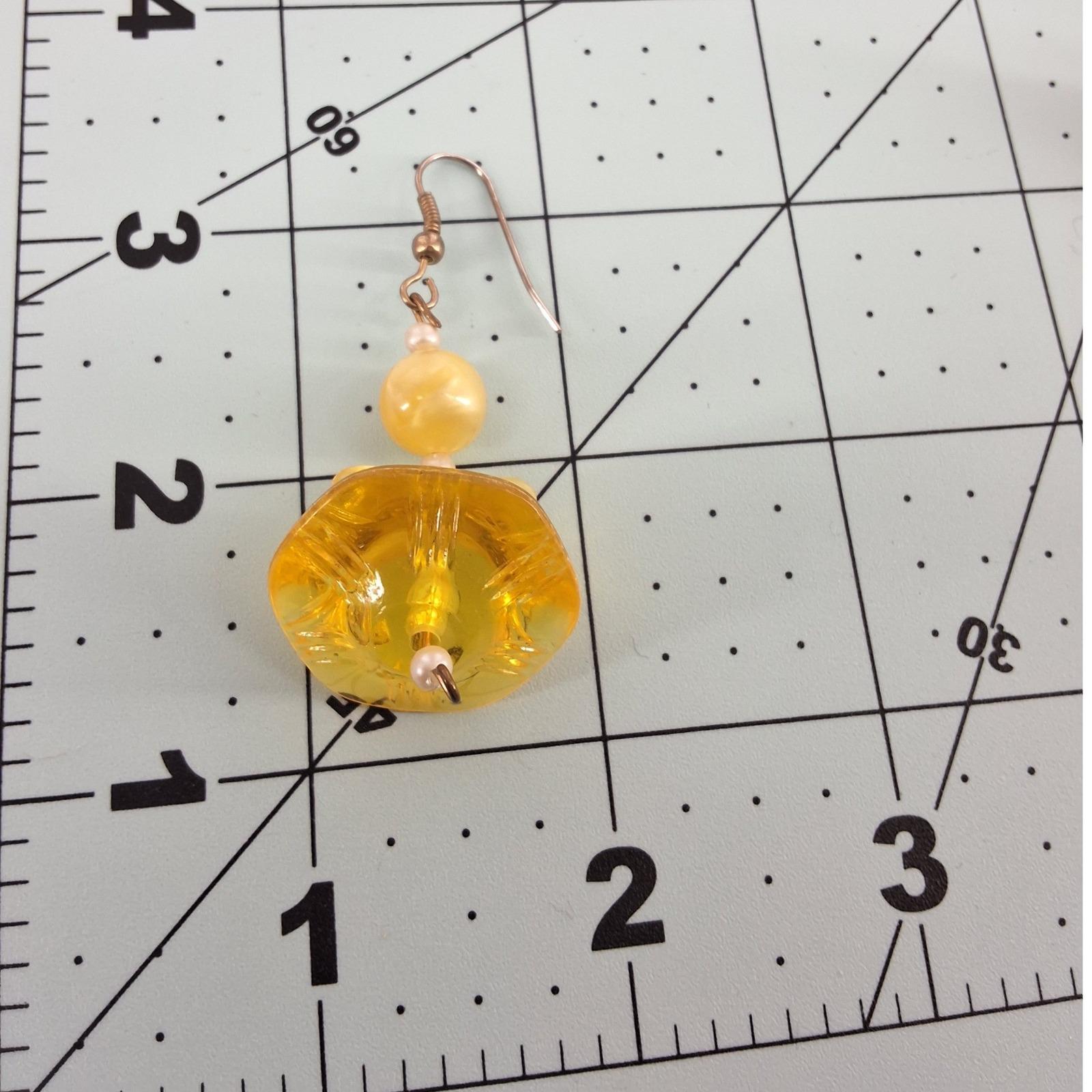 Yellow Carved Floral Resin Drop Earrings Gold Tone Hooks Vintage Style