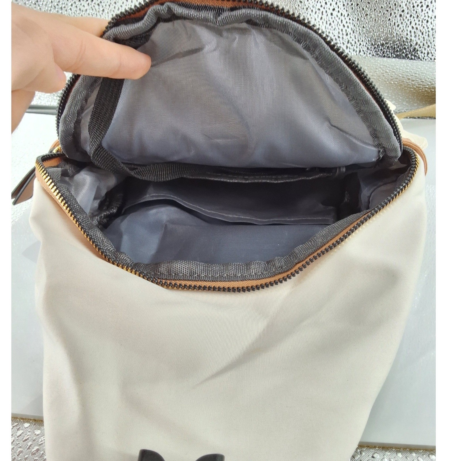 Cream Quilted Nylon Sling Bag Unisex Crossbody Backpack Headphone Port - View 6